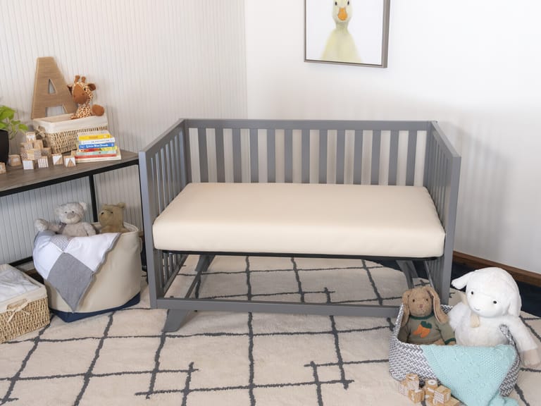 2 mattresses in crib clearance