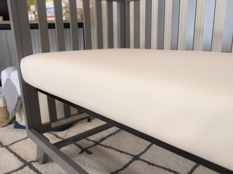 2 mattresses in crib clearance