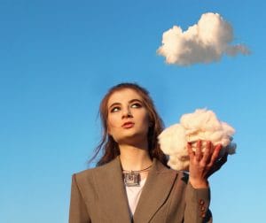 Woman holding cluster of supima cotton